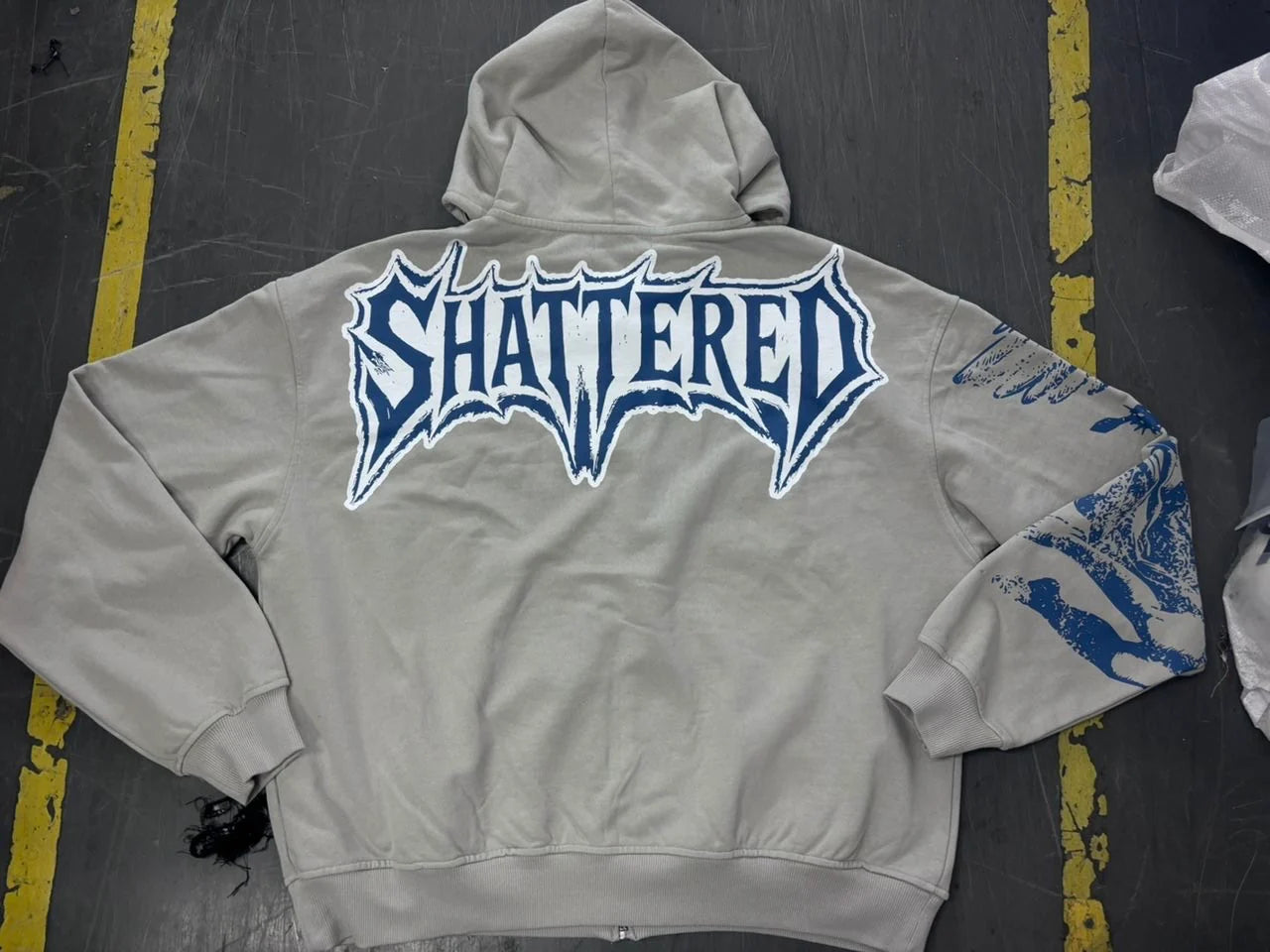 SHATTERED 'Catching Feelings' Zip Up Hoodie- Grey